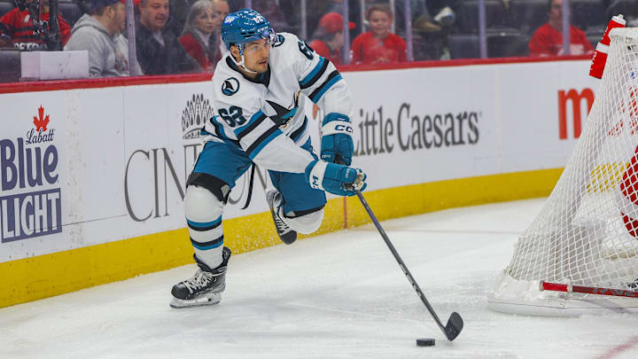 Dec 7, 2023; Detroit, Michigan, USA; San Jose Sharks right wing Kevin Labanc (62) handles the puck during the first period at Little Caesars Arena. Mandatory Credit: Brian Bradshaw Sevald-Imagn Images