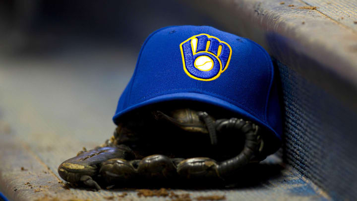 June 10, 2011; Milwaukee, WI, USA; A Milwaukee Brewers hat and glove during the game against the St. Louis Cardinals at Miller Park. The Brewers defeated the Cardinals 8-0. Mandatory Credit: Jeff Hanisch-Imagn Images June 10, 2011; Milwaukee, WI, USA; A Milwaukee Brewers hat and glove during the game against the St. Louis Cardinals at Miller Park. The Brewers defeated the Cardinals 8-0. Mandatory Credit: Jeff Hanisch-Imagn Images