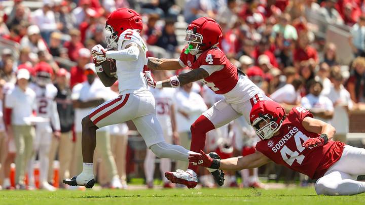 Oklahoma Sooners wide receiver Jahsiear Rogers (2) is chased by defensive back Courtland Guillory (4) and defensive lineman Taylor Wein (44) during the Oklahoma Spring Game at Gaylord Family Memorial Stadium. Oklahoma Sooners wide receiver Jahsiear Rogers (2) is chased by defensive back Courtland Guillory (4) and defensive lineman Taylor Wein (44) during the Oklahoma Spring Game at Gaylord Family Memorial Stadium.