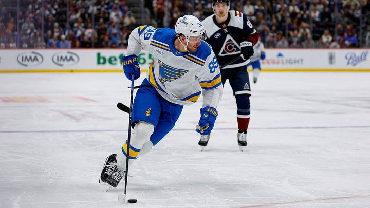 Apr 5, 2026; Denver, Colorado, USA; St. Louis Blues left wing Pavel Buchnevich (89) controls the puck in the third period against the Colorado Avalanche at Ball Arena. Mandatory Credit: Isaiah J. Downing-Imagn Images