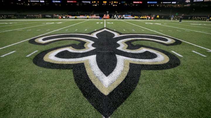 Jan 2, 2022; New Orleans, Louisiana, USA;  The New Orleans Saints logo on the field before their game against the Carolina Panthers at the Caesars Superdome. Mandatory Credit: Chuck Cook-Imagn Images