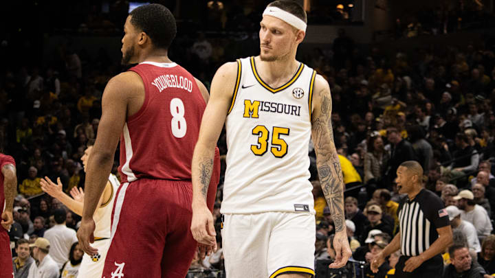 Feb. 19, 2025; Columbia, Missouri, USA; Missouri Tigers Jacob Crews (35) against Alabama Crimson Tide guard Chris Youngblood at Mizzou Arena.
