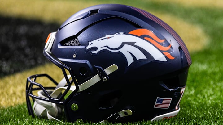 Aug 23, 2025; New Orleans, Louisiana, USA; Detailed view of the Denver Broncos helmet against the New Orleans Saints during warmups at Caesars Superdome. Mandatory Credit: Stephen Lew-Imagn Images