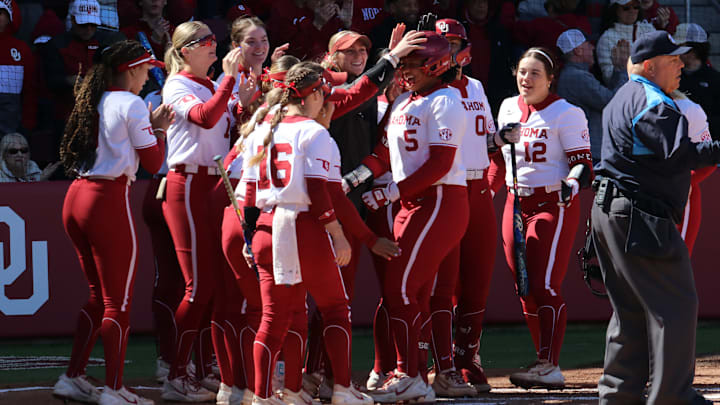 Oklahoma celebrates Ella Parker's home run at the plate earlier this season. The Sooners tied the NCAA and program record for home runs in a season Tuesday against Arkansas-Pine Bluff at Love's Field.