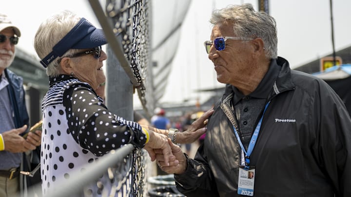 May 17, 2023; Speedway, Indiana, USA; Mario Andretti shares a moment with a fan during Indy500 May 17, 2023; Speedway, Indiana, USA; Mario Andretti shares a moment with a fan during Indy500