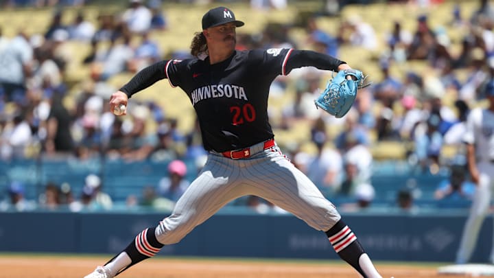 Jul 23, 2025; Los Angeles, California, USA; Minnesota Twins starting pitcher Chris Paddack (20) throws during the second inning against the Los Angeles Dodgers at Dodger Stadium. Mandatory Credit: Kiyoshi Mio-Imagn Images