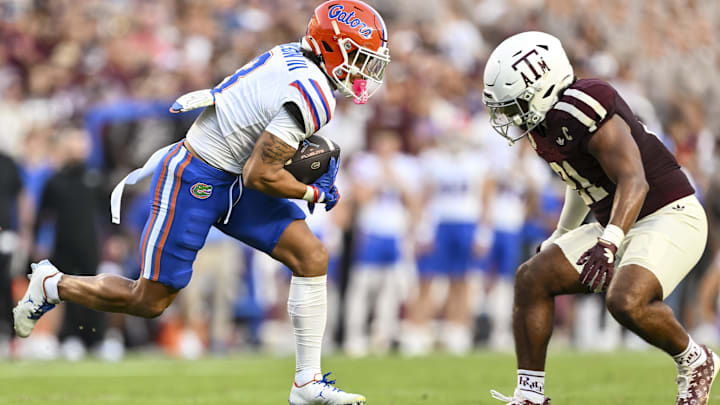 Oct 11, 2025; College Station, Texas, USA; Florida Gators wide receiver Eugene Wilson III (3) runs the ball during the first quarter as Texas A&M Aggies linebacker Taurean York (21) defends at Kyle Field. Mandatory Credit: Maria Lysaker-Imagn Images Oct 11, 2025; College Station, Texas, USA; Florida Gators wide receiver Eugene Wilson III (3) runs the ball during the first quarter as Texas A&M Aggies linebacker Taurean York (21) defends at Kyle Field. Mandatory Credit: Maria Lysaker-Imagn Images