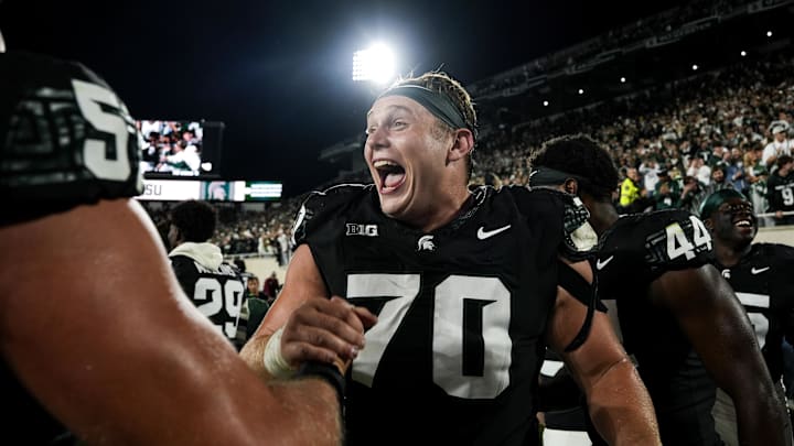Sep 6, 2025; East Lansing, Michigan, USA; Michigan State offensive lineman Luka Vincic (70) celebrates a double-overtime victory over Boston College at Spartan Stadium. Mandatory Credit: Brendan Mullin-Imagn Images