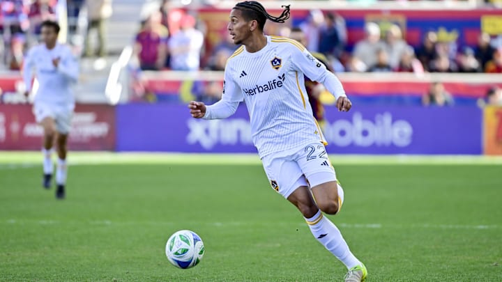 Apr 5, 2025; Sandy, Utah, USA; LA Galaxy midfielder Elijah Wynder (22) dribbles the ball down the pitch against Real Salt Lake during the second half at America First Field. Mandatory Credit: Christopher Creveling-Imagn Images