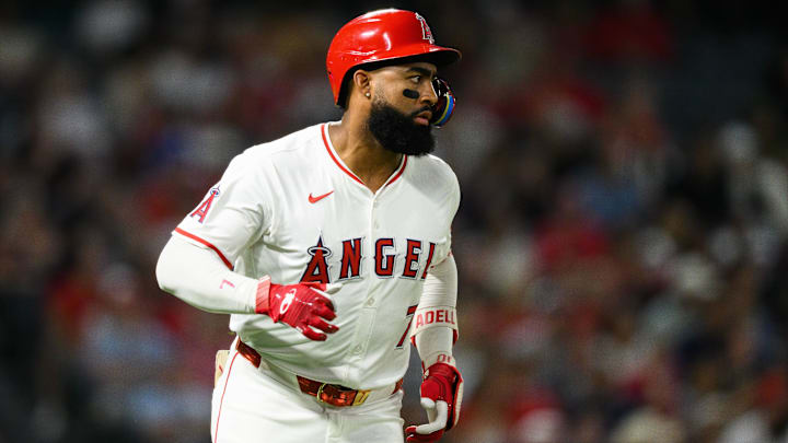 Sep 25, 2025; Anaheim, California, USA; Los Angeles Angels right fielder Jo Adell (7) runs after hitting a single during the sixth inning against the Kansas City Royals at Angel Stadium. Mandatory Credit: William Liang-Imagn Images