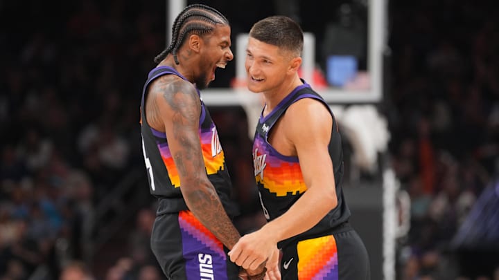 Mar 6, 2026; Phoenix, Arizona, USA; Phoenix Suns guard Jalen Green (4) celebrates with Phoenix Suns guard Grayson Allen (8) against the New Orleans Pelicans during the first half at Mortgage Matchup Center. Mandatory Credit: Joe Camporeale-Imagn Images