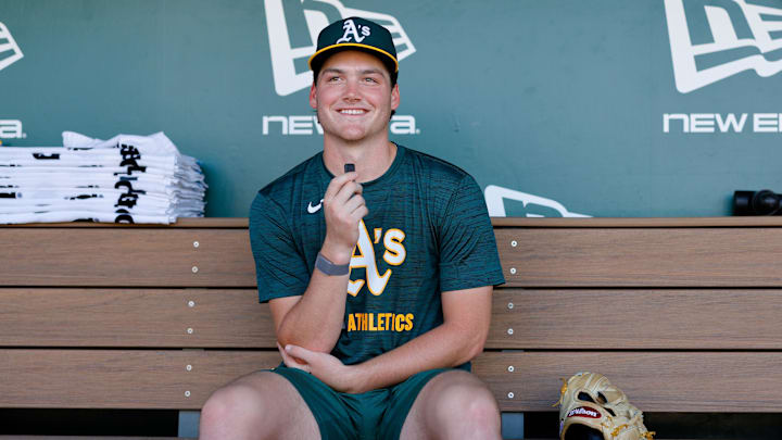 Jul 28, 2025; West Sacramento, California, USA; Athletics 2025 1st round draft pick Jamie Arnold speaks with members of the media before the game against the Seattle Mariners at Sutter Health Park. Mandatory Credit: Sergio Estrada-Imagn Images Jul 28, 2025; West Sacramento, California, USA; Athletics 2025 1st round draft pick Jamie Arnold speaks with members of the media before the game against the Seattle Mariners at Sutter Health Park. Mandatory Credit: Sergio Estrada-Imagn Images