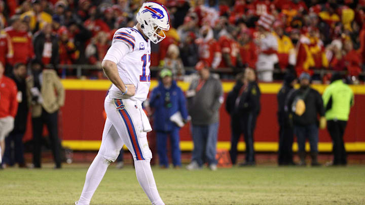 Buffalo Bills quarterback Josh Allen walks off the field after the Chiefs beat the Bills 42-36 in overtime.