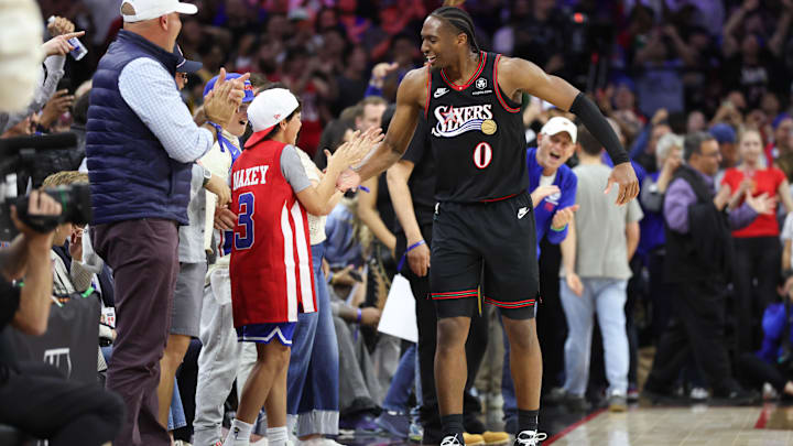 Apr 15, 2026; Philadelphia, Pennsylvania, USA; Philadelphia 76ers guard Tyrese Maxey (0) reacts with fans in the final seconds of the game against the Orlando Magic in a play-in round of the 2026 NBA Playoffs at Xfinity Mobile Arena. Mandatory Credit: Bill Streicher-Imagn Images
