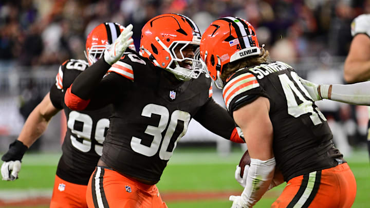 Nov 16, 2025; Cleveland, Ohio, USA; Cleveland Browns linebacker Carson Schwesinger (49) celebrates an interception with linebacker Devin Bush (30) during the third quarter against the Baltimore Ravens at Huntington Bank Field. Mandatory Credit: Ken Blaze-Imagn Images