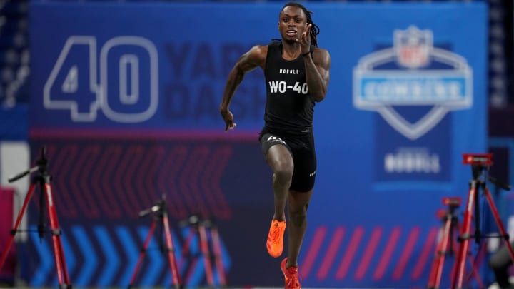 Mar 2, 2024; Indianapolis, IN, USA; Texas wide receiver Xavier Worthy (WO40) ran an official time of 4.21 seconds to set a combine record during the 2024 NFL Combine at Lucas Oil Stadium. Mandatory Credit: Kirby Lee-USA TODAY Sports