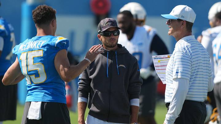Jul 31, 2026; El Segundo, CA, USA; Los Angeles Chargers receiver Ladd McConkey (left), offensive coordinator Mike McDaniel (center) and coach Jim Harbaugh during training camp at The Bolt. Mandatory Credit: Kirby Lee-Imagn Images Jul 31, 2026; El Segundo, CA, USA; Los Angeles Chargers receiver Ladd McConkey (left), offensive coordinator Mike McDaniel (center) and coach Jim Harbaugh during training camp at The Bolt. Mandatory Credit: Kirby Lee-Imagn Images