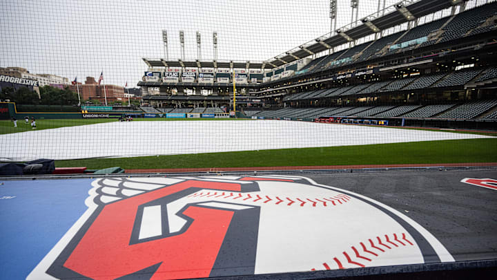 Aug 17, 2023; Cleveland, Ohio, USA; The tarp covers the field as the game between the Cleveland Guardians and the Detroit Tigers is postponed at Progressive Field.