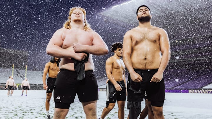 John Mills and Kodi Greene enjoy a snow flurry or two.