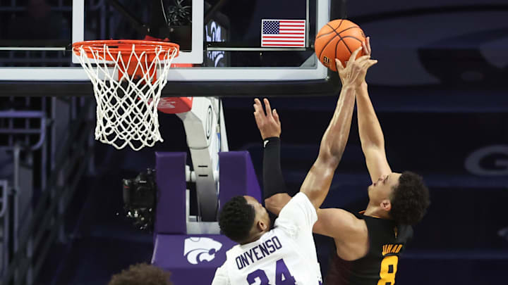 Feb 23, 2025; Manhattan, Kansas, USA; Arizona State Sun Devils forward Basheer Jihad (8) goes to the basket against Kansas State Wildcats center Ugonna Onyenso (34) during the second half at Bramlage Coliseum. Mandatory Credit: Scott Sewell-Imagn Images