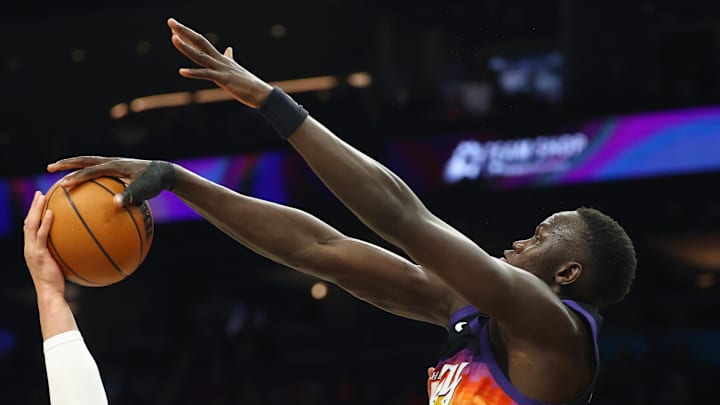 Apr 8, 2026; Phoenix, Arizona, USA; Phoenix Suns center Khaman Maluach (10) blocks the shot of Dallas Mavericks forward Dwight Powell (7) in the first half at Mortgage Matchup Center.