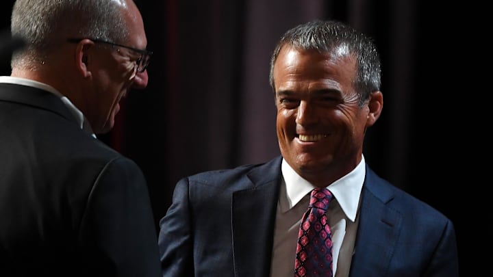 Jul 20, 2023; Nashville, TN, USA; South Carolina Gamecocks head coach Shane Beamer shakes hands with SEC Commissioner Greg Sankey as he takes the stage to speak during SEC Media Day at Grand Hyatt. Mandatory Credit: Christopher Hanewinckel-Imagn Images