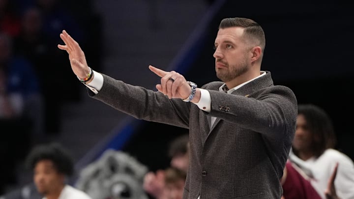 Mar 12, 2026; Charlotte, NC, USA; Florida State Seminoles head coach Luke Loucks in the first half at Spectrum Center. Mandatory Credit: Bob Donnan-Imagn Images