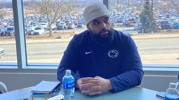 Penn State Nittany Lions defensive tackle Siale Taupaki speaks with reporters at Beaver Stadium.