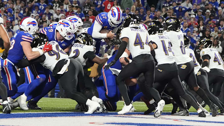 Buffalo Bills quarterback Josh Allen scores a touchdown  during the fourth quarter against the Baltimore Ravens.