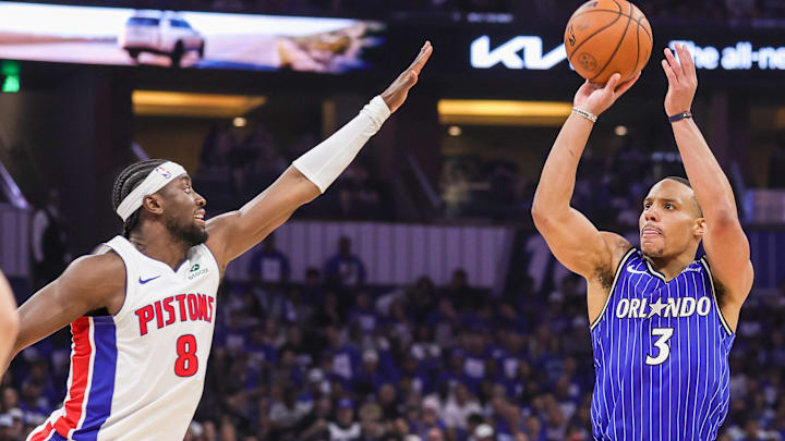 Apr 27, 2026; Orlando, Florida, USA; Orlando Magic guard Desmond Bane (3) shoots against Detroit Pistons guard Caris LeVert (8) during the second half during game four of the first round of the 2026 NBA Playoffs at Kia Center. Mandatory Credit: Mike Watters-Imagn Images