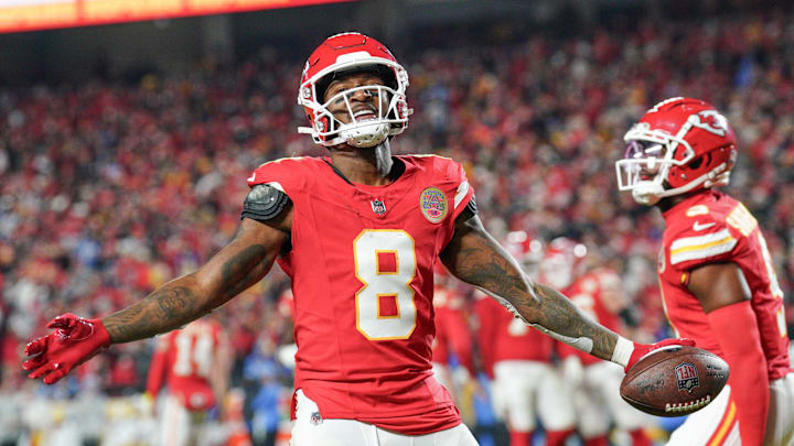 Dec 8, 2024; Kansas City, Missouri, USA; Kansas City Chiefs wide receiver DeAndre Hopkins (8) celebrates after scoring against the Los Angeles Chargers during the first half at GEHA Field at Arrowhead Stadium. Mandatory Credit: Denny Medley-Imagn Images