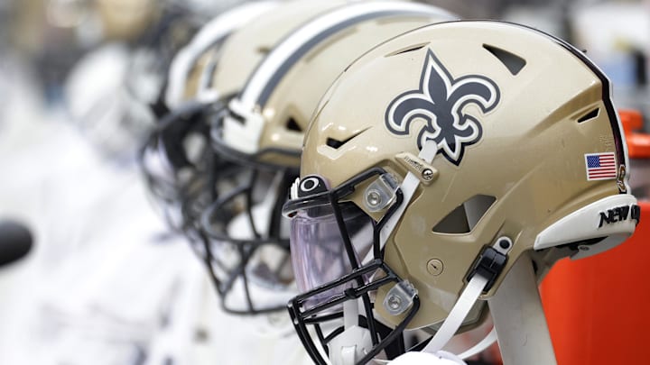 Oct 10, 2021; Landover, Maryland, USA; New Orleans Saints players' helmets on the bench against the Washington Football Team at FedExField. Mandatory Credit: Geoff Burke-Imagn Images