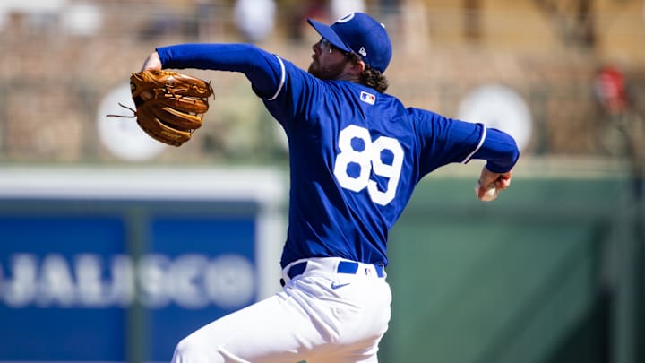 Feb 23, 2024; Phoenix, Arizona, USA; Los Angeles Dodgers pitcher Tanner Dodson against the San Diego Padres during a spring training game at Camelback Ranch-Glendale. Mandatory Credit: Mark J. Rebilas-Imagn Images Feb 23, 2024; Phoenix, Arizona, USA; Los Angeles Dodgers pitcher Tanner Dodson against the San Diego Padres during a spring training game at Camelback Ranch-Glendale. Mandatory Credit: Mark J. Rebilas-Imagn Images