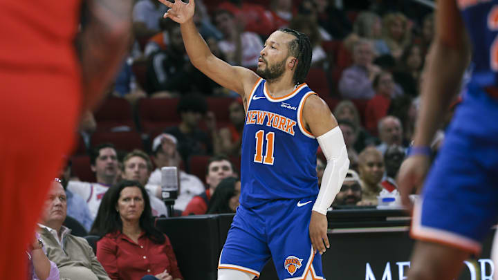 Nov 4, 2024; Houston, Texas, USA; New York Knicks guard Jalen Brunson (11) reacts after making a basket during the third quarter against the Houston Rockets at Toyota Center. Mandatory Credit: Troy Taormina-Imagn Images