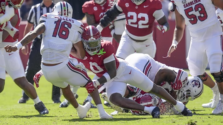 Oct 12, 2024; Tuscaloosa, Alabama, USA;  South Carolina Gamecocks quarterback LaNorris Sellers (16) is sacked for a loss by Alabama Crimson Tide linebacker Deontae Lawson (0) at Bryant-Denny Stadium. Mandatory Credit: Gary Cosby Jr.-Imagn Images