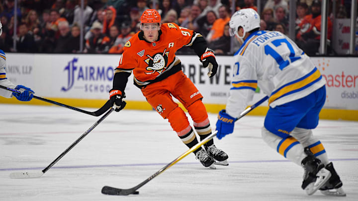 Apr 3, 2026; Anaheim, California, USA; Anaheim Ducks center Leo Carlsson (91) moves in for the puck against St. Louis Blues defenseman Cam Fowler (17) during the second period at Honda Center. Mandatory Credit: Gary A. Vasquez-Imagn Images