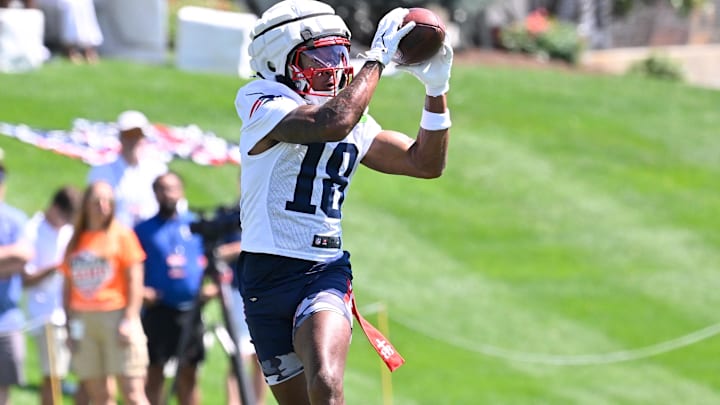 Jul 23, 2025; Foxborough, MA, USA; New England Patriots wide receiver Kyle Williams (18) makes a catch during training camp at Gillette Stadium. Mandatory Credit: Eric Canha-Imagn Images