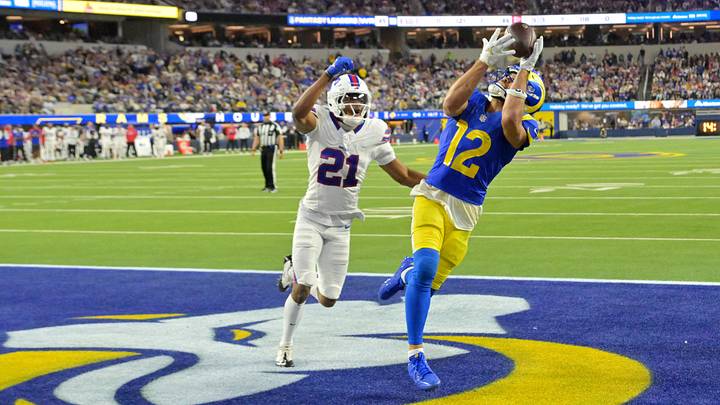 Oct 12, 2026; Inglewood, California, USA;  Los Angeles Rams wide receiver Puka Nacua (12) makes a catch for a touchdown as Buffalo Bills cornerback Davison Igbinosun (21) defends during the fourth quarter at SoFi Stadium.  Mandatory Credit: Jayne Kamin-Oncea-Imagn Images