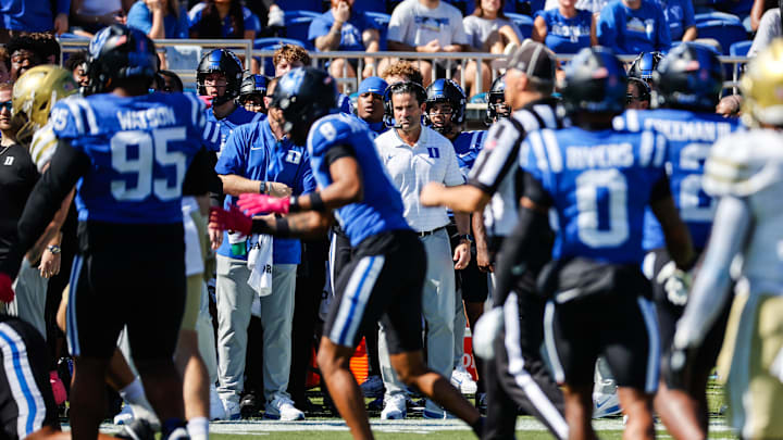 Oct 18, 2025; Durham, North Carolina, USA; Duke Blue Devils head coach Manny Diaz looks on during the first half of the game against Georgia Tech Yellow Jackets at Wallace Wade Stadium. Mandatory Credit: Jaylynn Nash-Imagn Images Oct 18, 2025; Durham, North Carolina, USA; Duke Blue Devils head coach Manny Diaz looks on during the first half of the game against Georgia Tech Yellow Jackets at Wallace Wade Stadium. Mandatory Credit: Jaylynn Nash-Imagn Images