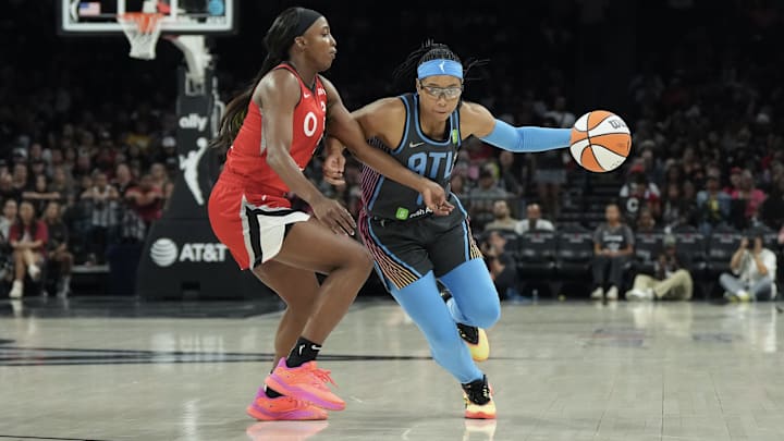 Jul 22, 2025; Las Vegas, Nevada; Atlanta Dream guard Allisha Gray (15) drives against Las Vegas Aces guard Jackie Young (0) in the third quarter of their game at Michelob Ultra Arena. Jul 22, 2025; Las Vegas, Nevada; Atlanta Dream guard Allisha Gray (15) drives against Las Vegas Aces guard Jackie Young (0) in the third quarter of their game at Michelob Ultra Arena.