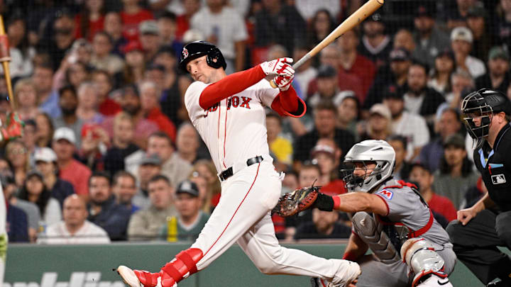 Sep 2, 2025; Boston, Massachusetts, USA;  Boston Red Sox third baseman Alex Bregman (2) hits a one run RBI during the eighth inning against the Cleveland Guardians at Fenway Park. Mandatory Credit: Eric Canha-Imagn Images