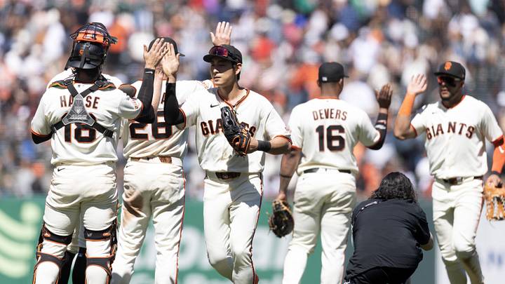 San Francisco Giants players celebrate their 3-2 victory over the Atlanta Braves. San Francisco Giants players celebrate their 3-2 victory over the Atlanta Braves.