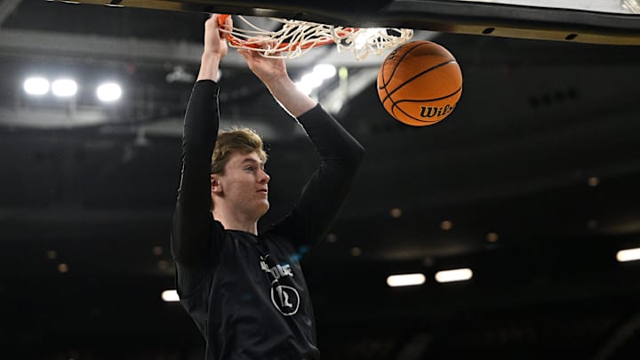 Purdue Boilermakers center Daniel Jacobsen (12) practices at Amica Mutual Pavilion.
