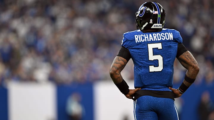 Nov 24, 2024; Indianapolis, Indiana, USA; Indianapolis Colts quarterback Anthony Richardson (5) stands on the field after a penalty is called during the second half against the Detroit Lions at Lucas Oil Stadium. Mandatory Credit: Marc Lebryk-Imagn Images
