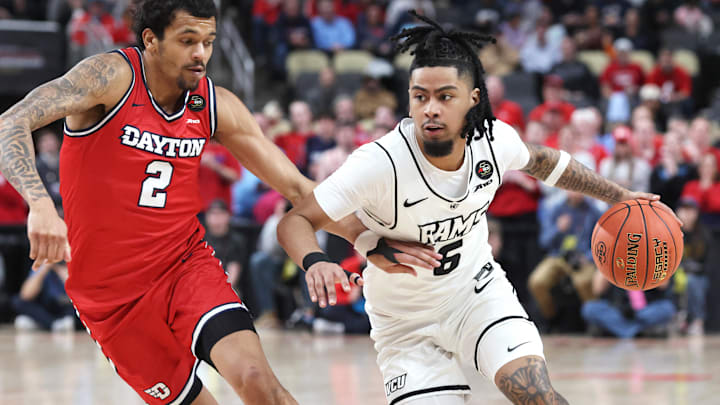 Mar 15, 2026; Pittsburgh, PA, USA; VCU Rams guard Terrence Hill Jr. (6) dribbles against IDayton Flyers guard De'shayne Montgomery (2) during the second half n the Atlantic 10 Conference Tournament Championship game at PPG Paints Arena. Mandatory Credit: Charles LeClaire-Imagn Images Mar 15, 2026; Pittsburgh, PA, USA; VCU Rams guard Terrence Hill Jr. (6) dribbles against IDayton Flyers guard De'shayne Montgomery (2) during the second half n the Atlantic 10 Conference Tournament Championship game at PPG Paints Arena. Mandatory Credit: Charles LeClaire-Imagn Images