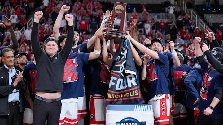 Mar 28, 2026; San Jose, CA, USA; The Arizona Wildcats celebrate with the West Regional Championship trophy after an Elite Eight game against the Purdue Boilermakers of the West Regional of the men's 2026 NCAA Tournament at SAP Center. Mandatory Credit: Kyle Terada-Imagn Images Mar 28, 2026; San Jose, CA, USA; The Arizona Wildcats celebrate with the West Regional Championship trophy after an Elite Eight game against the Purdue Boilermakers of the West Regional of the men's 2026 NCAA Tournament at SAP Center. Mandatory Credit: Kyle Terada-Imagn Images