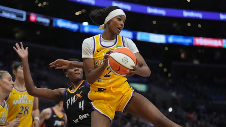 Sep 17, 2024; Los Angeles, California, USA; LA Sparks forward Rickea Jackson (2) rebounds the ball against the Phoenix Mercury in the first half at Crypto.com Arena. Mandatory Credit: Kirby Lee-Imagn Images Sep 17, 2024; Los Angeles, California, USA; LA Sparks forward Rickea Jackson (2) rebounds the ball against the Phoenix Mercury in the first half at Crypto.com Arena. Mandatory Credit: Kirby Lee-Imagn Images