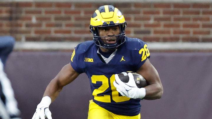 Nov 23, 2024; Ann Arbor, Michigan, USA;  Michigan Wolverines running back Kalel Mullings (20) rushes in the first half against the Northwestern Wildcats at Michigan Stadium. Mandatory Credit: Rick Osentoski-Imagn Images
