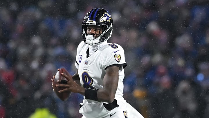 Jan 19, 2025; Orchard Park, New York, USA; Baltimore Ravens quarterback Lamar Jackson (8) looks to throw a pass in the fourth quarter of a 2025 AFC divisional round game against the Buffalo Bills at Highmark Stadium. Mandatory Credit: Mark Konezny-Imagn Images