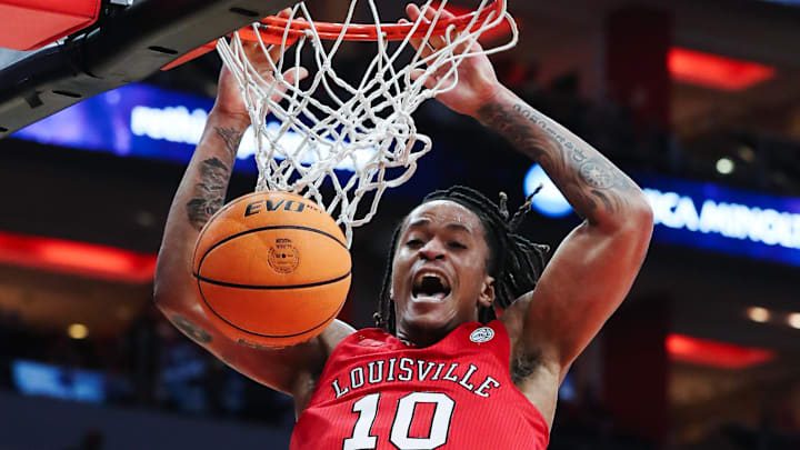 Louisville basketball's Kaleb Glenn (10) dunked against Boston College during their game at the KFC Yum! Center in Louisville, Ky. on Mar. 9, 2024.